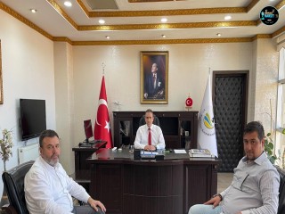 TANJU COŞGUN’DAN BURHANİYE İLÇE KAYMAKAMI İLYAS MEMİŞ'E ZİYARET