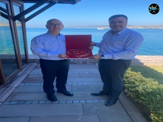 AYVALIK KAYMAKAMI HASAN YAMAN'A TANJU COŞGUN'DAN ZİYARET